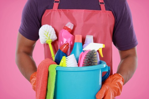 Commercial cleaning team working in a Pimlico office reception area