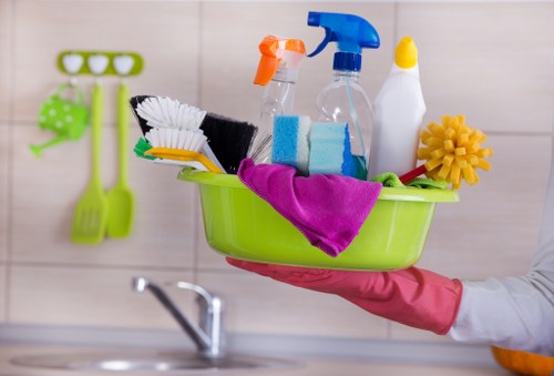 A professional cleaner treating high-traffic carpet areas in a Pimlico business property