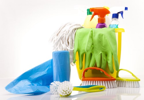 Cleaning staff sanitising shared kitchen and washroom areas in a Pimlico business property
